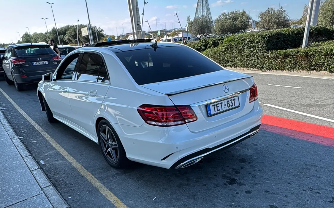 Costa Taxi CY white Mercedes-Benz E-Class sedan for a private transfer in Cyprus from Larnaca Airport